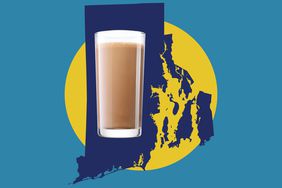 A glass of coffee milk over a map of Rhode Island.