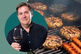 Ray Isle raising a glass of red wine in a photo composite with burgers and hot dogs on a grill. 