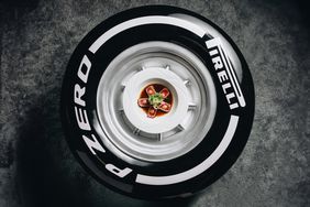 A plate of Ahi Tuna Tataki on a Pirelli tire well. 