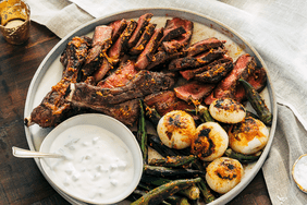 Grilled Rib Eye Steaks with Okra Suya and Cucumber-Yogurt Sauce